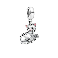Silver tiger charm.