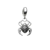 Silver spider charm.