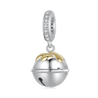 Silver and gold bell charm.