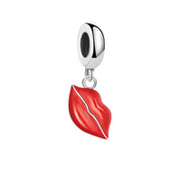 Silver and red lip charm.