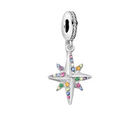 Silver charm with colorful gemstone accents.