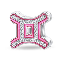 Pink and silver Gemini charm.
