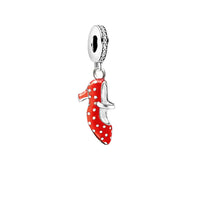 Red polka-dot shoe charm.