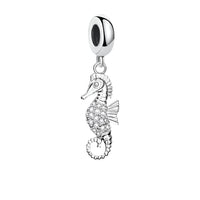 Silver seahorse charm.