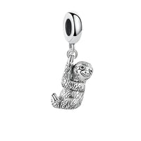 Silver sloth charm.