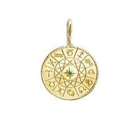 Gold zodiac pendant with a green gemstone.