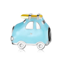 Blue car charm with yellow surfboard.