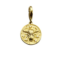 Gold Taurus pendant.