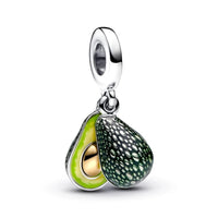 Sterling silver avocado charm with green enamel detailing and gold accent. Brand: Planet Charms.