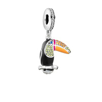 Toucan charm with colorful rhinestones.