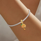 Gold Orange Charm