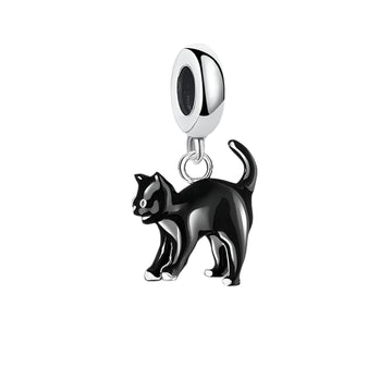 Black cat charm with shiny black enamel, featuring a playful design, by Planet Charms. Perfect for Halloween and costume par