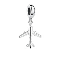 Silver airplane charm.