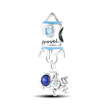 astronaut and rocket charm