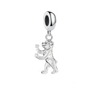Silver bear charm.