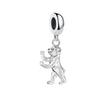 Silver bear charm.