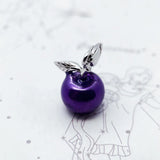 Purple apple charm with silver leaves.