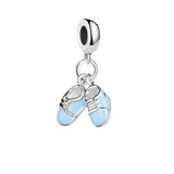 Silver baby shoe charm.