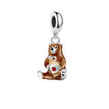 Bear charm holding a maple syrup bottle.