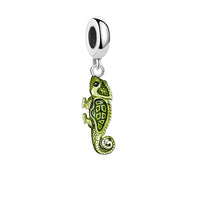 Green chameleon charm.