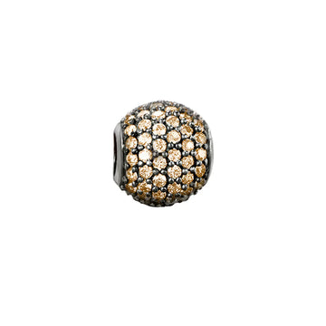 Sparkling golden charm bead.
