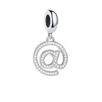 Silver ’@’ symbol charm.