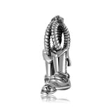 Sterling silver cowboy boot charm.