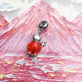 Red devil charm.
