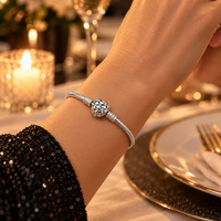 Diamond Heart Charm Bracelet worn for an elegant evening