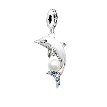 Silver dolphin charm with pearl and blue accents.
