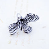Silver eagle pendant.