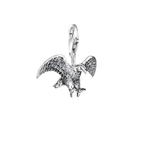 Silver eagle charm.