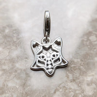 Silver fox head charm.