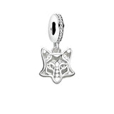 Silver fox charm with jeweled bail.