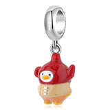 Red and tan penguin charm.