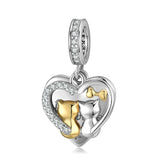 Silver heart charm with cat couple.