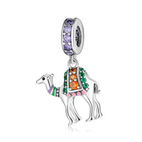 Camel charm with colorful gemstones.