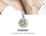 Circular, jeweled pendant.