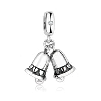 Silver charm with two hanging bells.