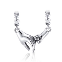 hand in hand charm