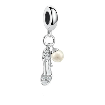 Silver charm with high heel shoe and pearl.