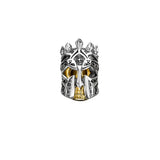 Silver and gold skull ring.