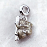 Silver koala charm.