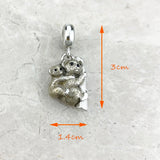 Silver koala charm.