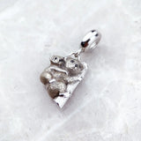 Silver koala charm.