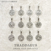 Zodiac sign pendant charms.