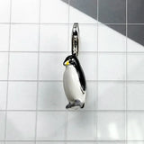Penguin charm with silver clasp.