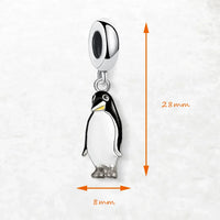 Penguin charm with silver accents.