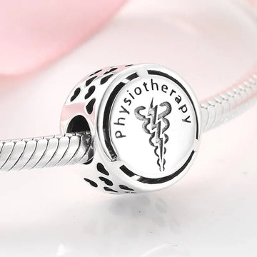 Silver physiotherapy charm.