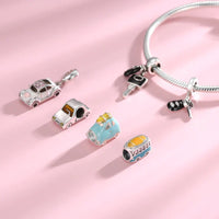 Charm bracelet with car and key charms.